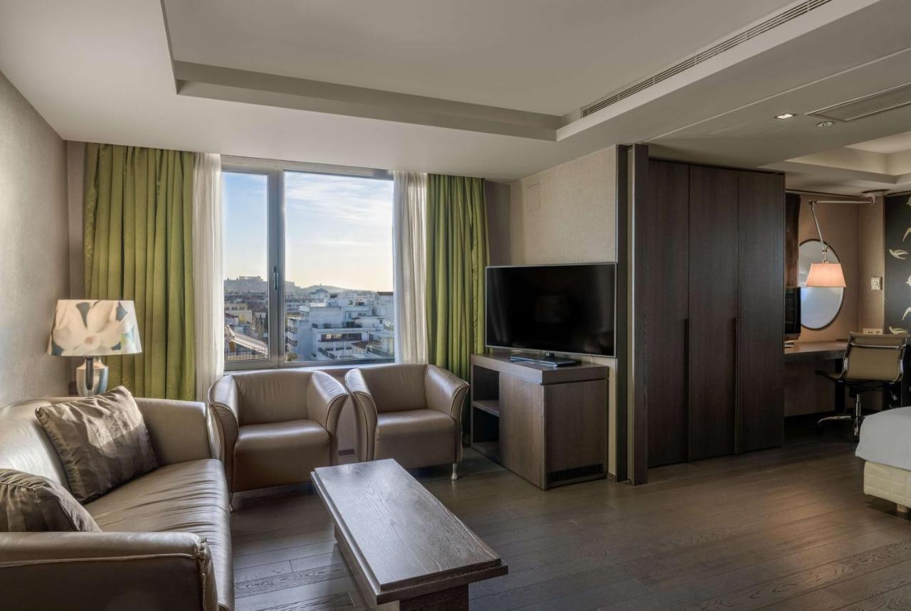 Radisson Blu Park Hotel Atene Esterno foto A suite at the hotel