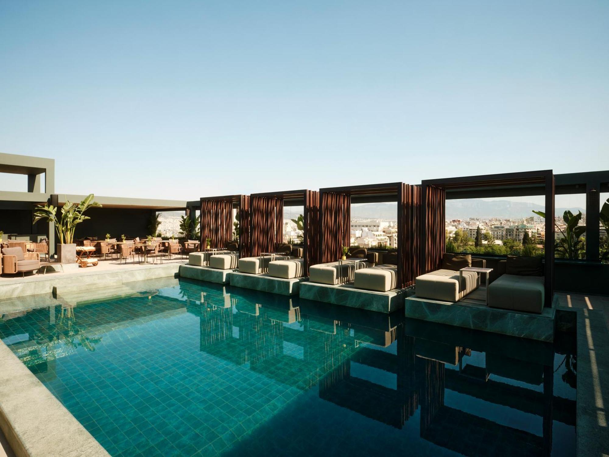 Radisson Blu Park Hotel Atene Esterno foto The pool at the hotel